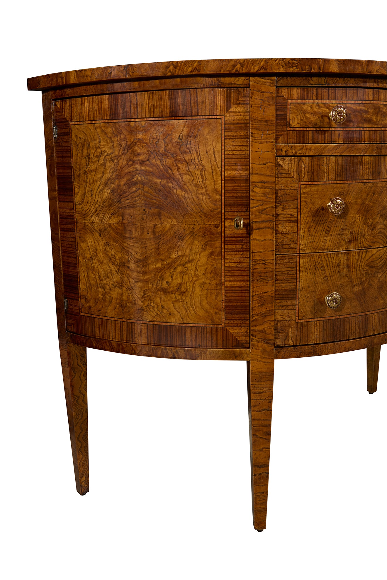 Curved wooden sideboard with three drawers and cabinet door featuring rich grain patterns and brass knobs