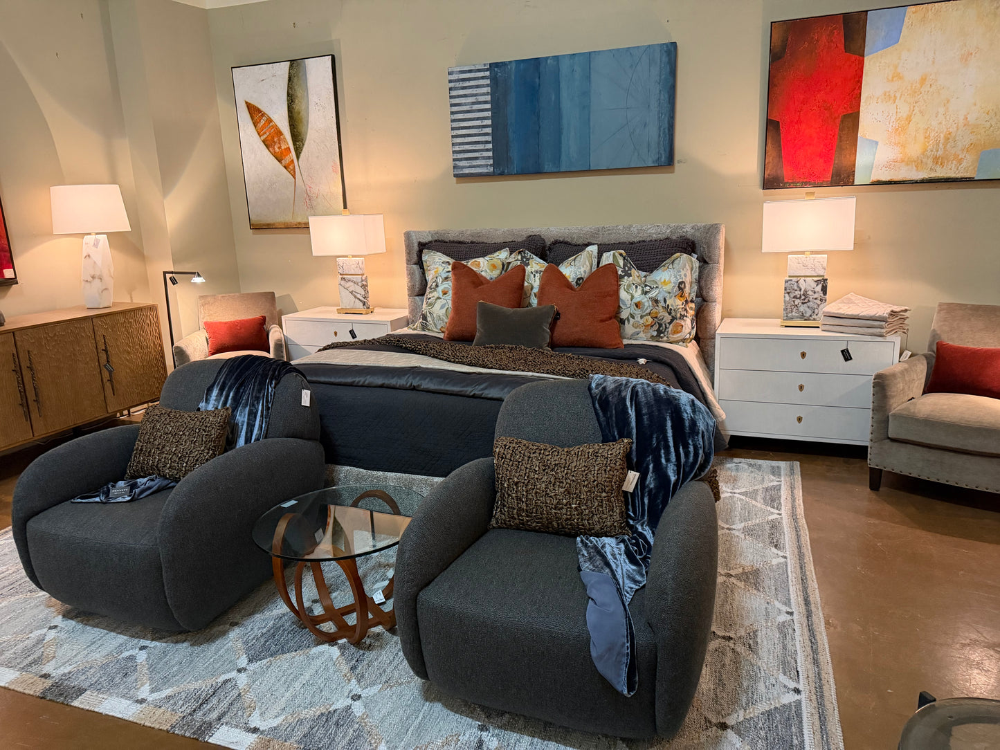 White modern chest of drawers with clean lines and minimalist design, featuring multiple drawers with sleek hardware, positioned as bedroom nightstand in contemporary setting