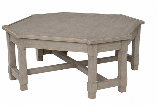 Octagonal coffee table in distressed gray-brown wood finish with decorative molded edges, square tapered legs, and cross-stretcher base support.
