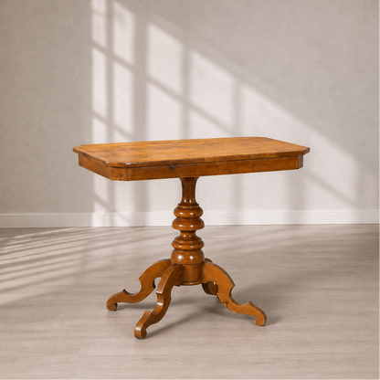 Antique-style walnut pedestal side table with rectangular top, turned column base, and ornate carved tripod legs with scrolled feet, warm honey-brown finish