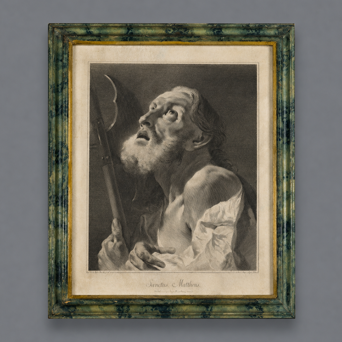 Antique mezzotint engraving of Sanctus Mattheus in ornate green marbled frame with gold inner border, depicting Saint Matthew gazing upward holding a halberd.