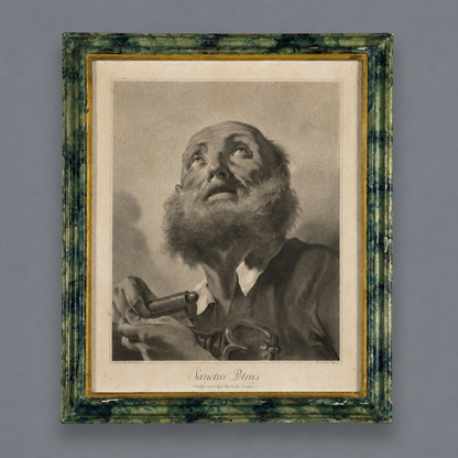 Framed mezzotint engraving 'Sanctus Petrus' depicting Saint Peter gazing upward, holding keys, in a distressed green marbled wood frame with gold inner border.