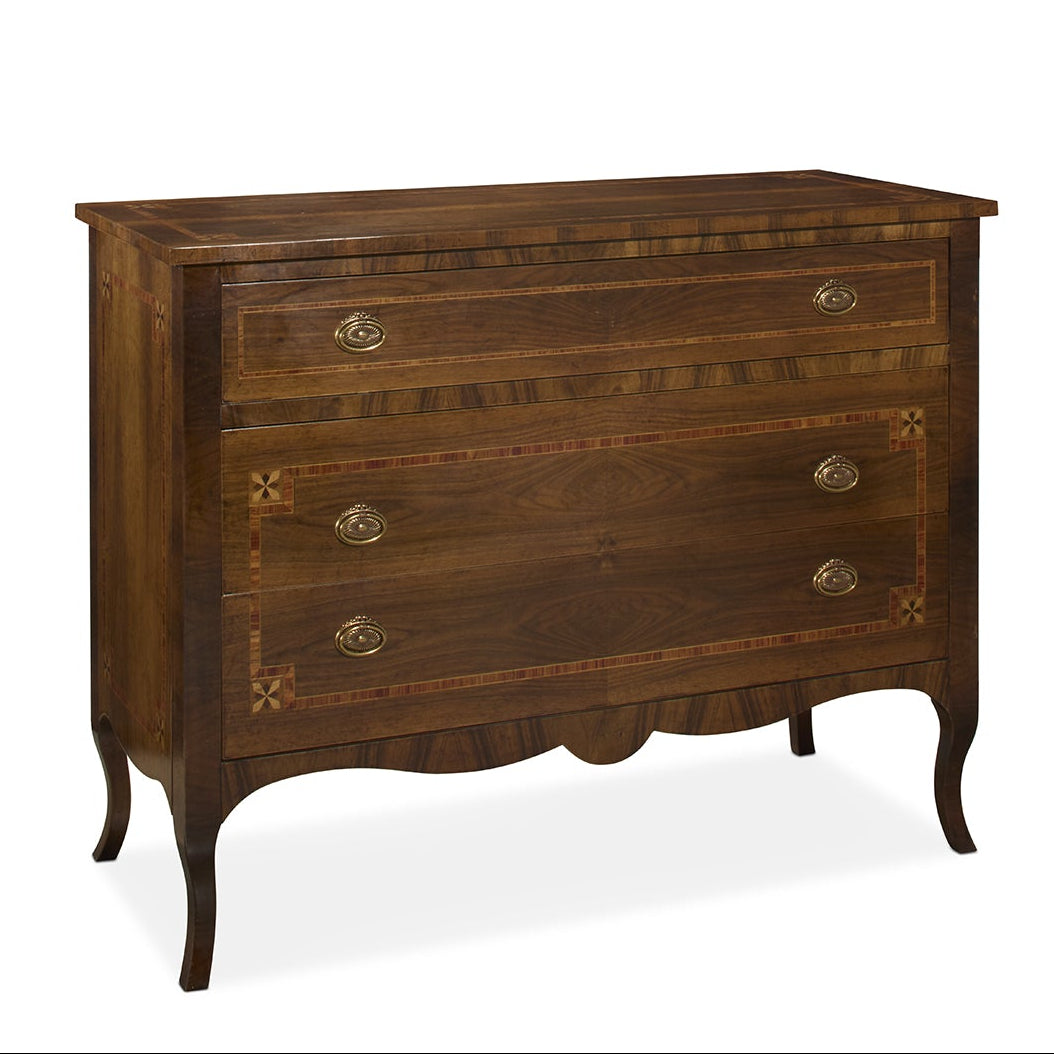 Traditional wooden chest of drawers with rich brown walnut finish, featuring three drawers with brass oval pulls, decorative inlay details, and curved cabriole legs