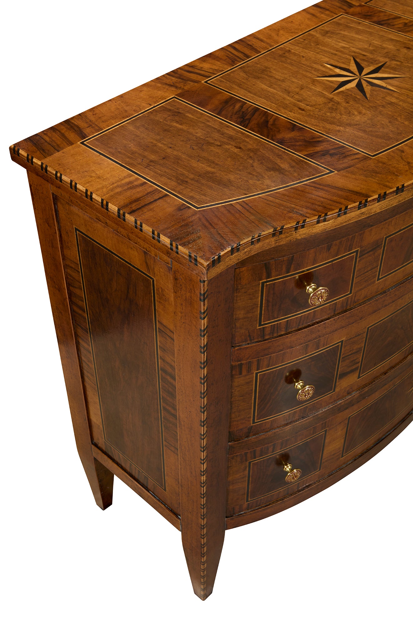 Traditional wooden chest with rich walnut finish featuring decorative inlay work, curved front drawers with brass pulls, geometric star motif on top, and intricate border detailing