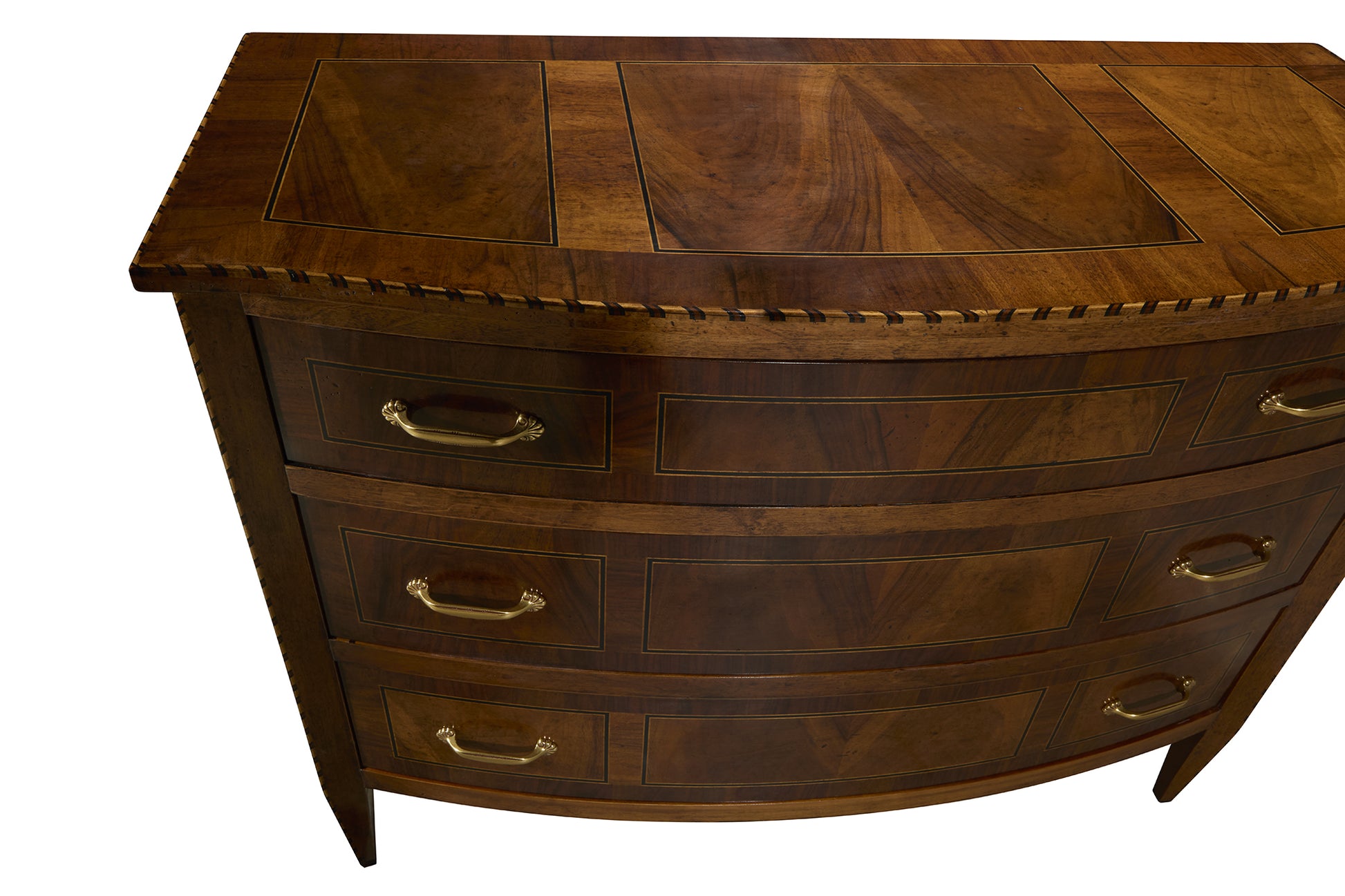 Traditional curved front chest of drawers in rich brown wood with brass hardware, featuring decorative inlay panels on top and rope-twist edge detail