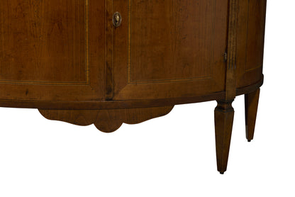Vintage-style wooden cabinet with rich brown finish, decorative keyhole escutcheon, scalloped apron, and tapered legs