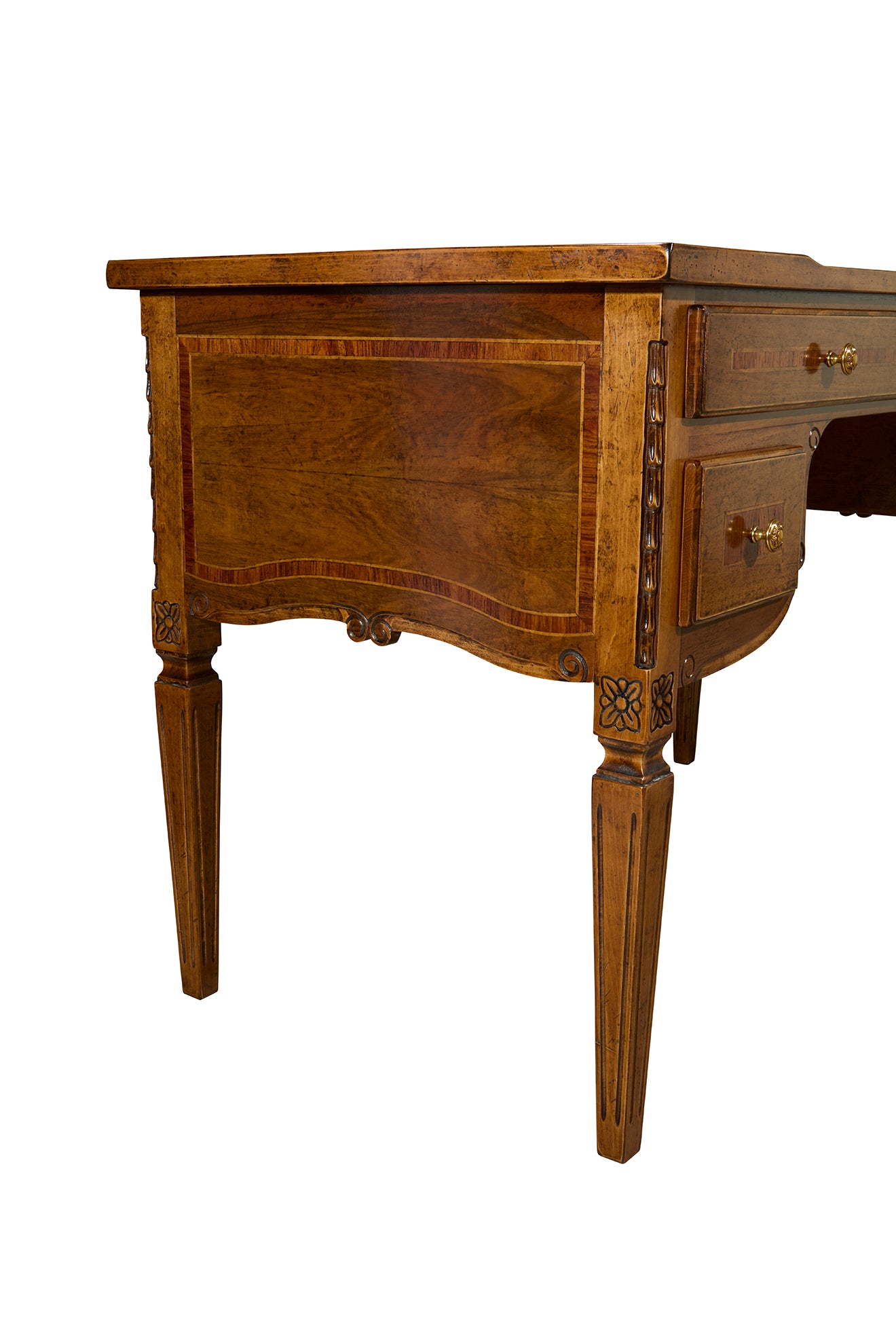 Ornate wooden desk with curved front, decorative inlay work, brass handles, carved legs, and rich brown finish in traditio...