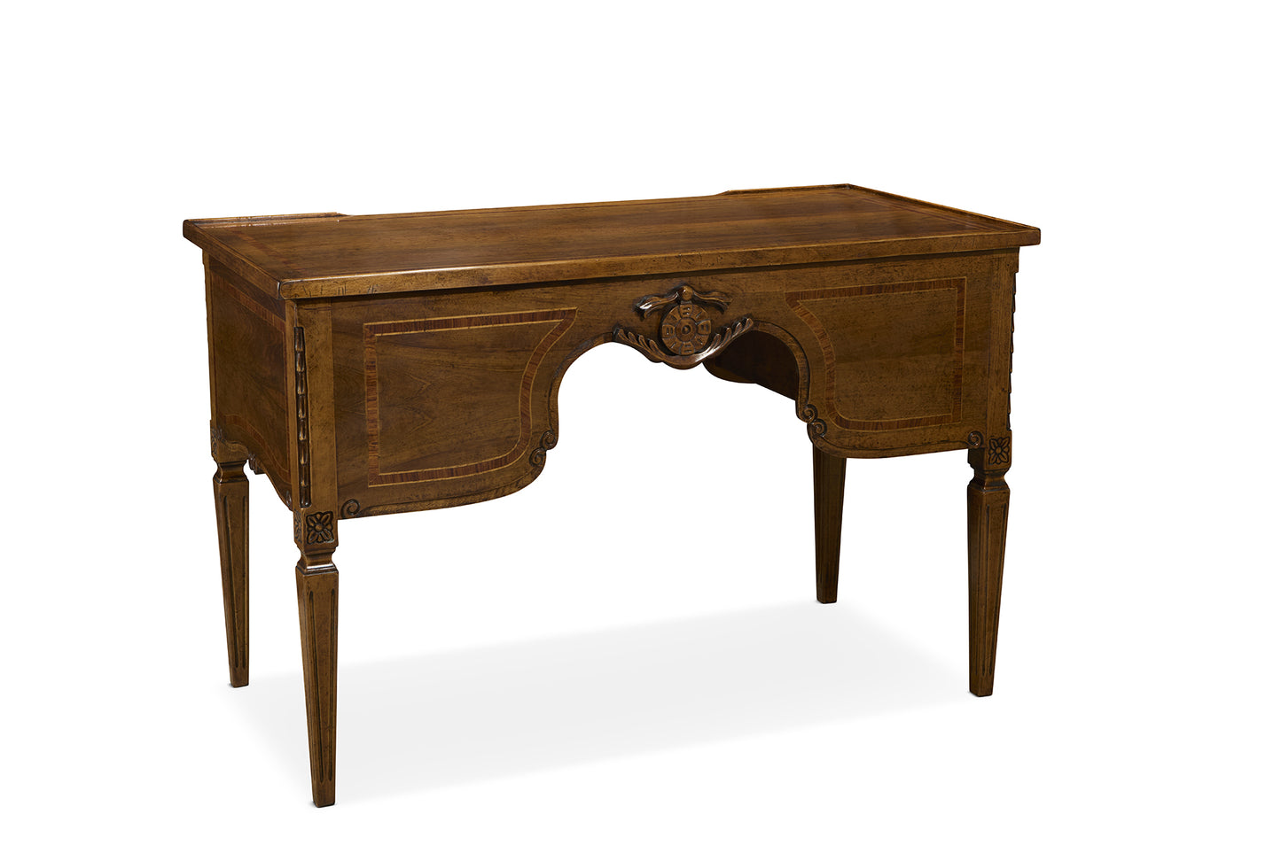 Traditional brown wood desk with carved decorative details, curved apron, and tapered legs